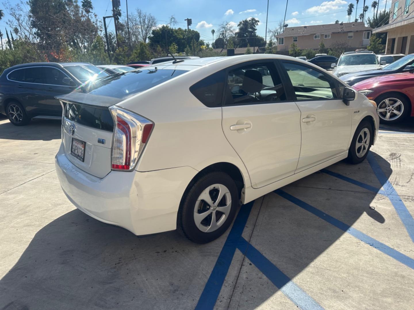 2012 WHITE Toyota Prius Cloth (JTDKN3DU3C1) with an 4 Cylinder engine, AUTOMATIC transmission, located at 30 S. Berkeley Avenue, Pasadena, CA, 91107, (626) 248-7567, 34.145447, -118.109398 - Crown City Motors is a used “Buy Here Pay Here” car dealer in Pasadena CA. “Buy Here Pay Here” financing, means that when you purchase your vehicle from our dealership, that you make the payments to the dealership as well. We do not need the banks approval to get you approved for a used auto - Photo#4